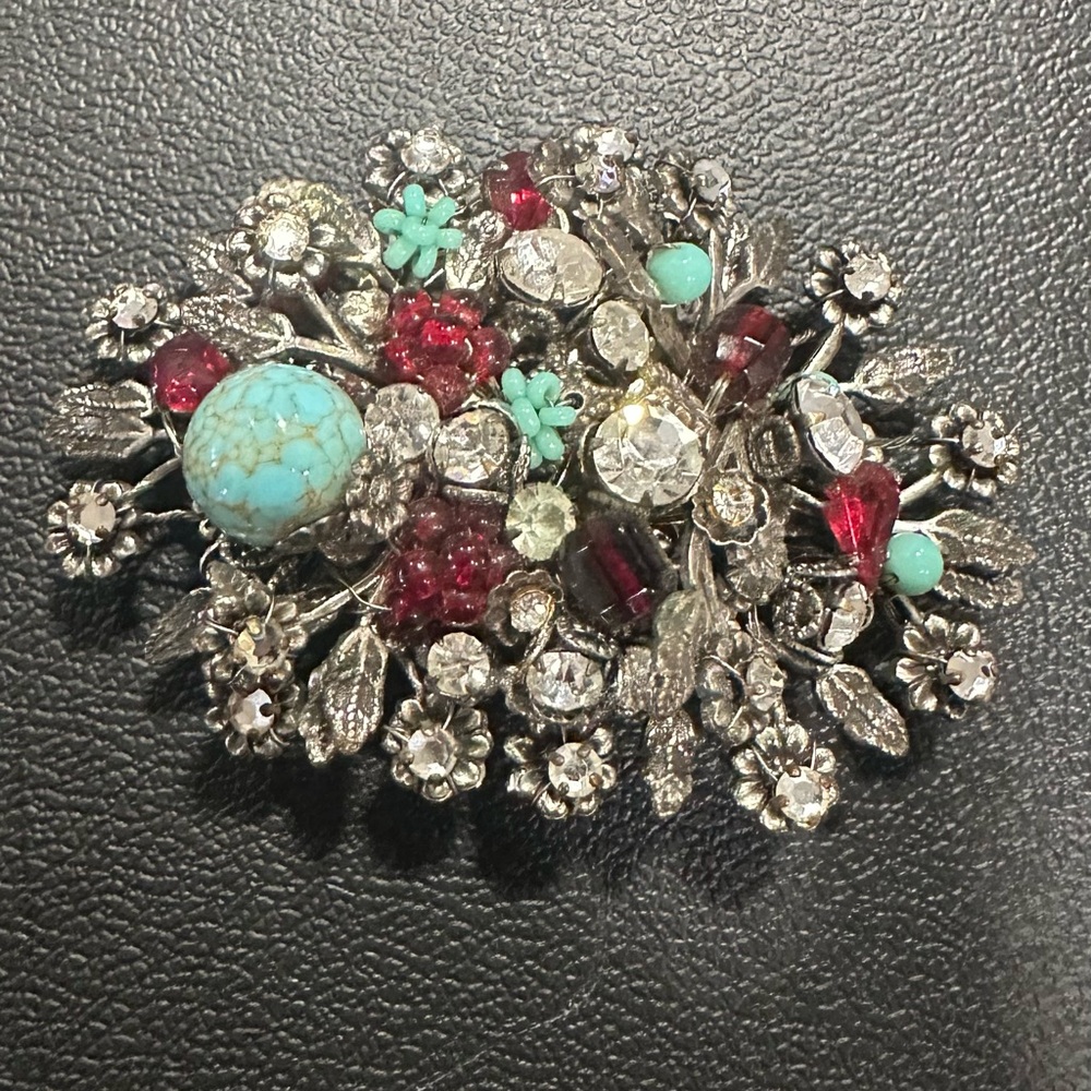 Elegant Silver and Red Floral BroochDeMario